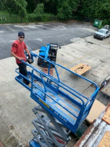 Electrician on aerial lift
